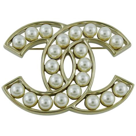 chanel brooches plus prices|chanel brooch cost.